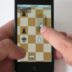 Hold and Move in Action: The thumb 'holds' the background, the index finger moves the piece